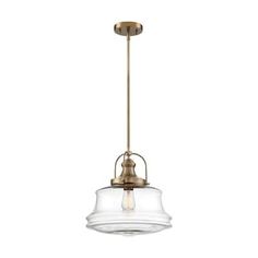 a light fixture with a clear glass shade on the bottom and an antique brass finish