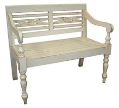 a white wooden bench sitting on top of a white floor