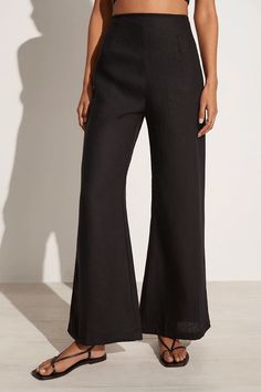 Discover our signature silhouette in the Ottavio Pants. Crafted from certified and responsibly sourced linen hand-dyed in a timeless black hue, these high-waisted linen pants offer a relaxed fit and flattering flare shape. This wardrobe essential is designed to be loved all year round and can be effortlessly styled with a linen crop top for a summer-ready look or an oversized long sleeve shirt to transition to the cooler months. Hoi An Tailor, High Waisted Linen Pants, Linen Dress Pants, Spring Summer Capsule Wardrobe, Oversized Long Sleeve Shirt, Black Linen Pants, Linen Sundress, Mod Cloth, Linen Crop Top