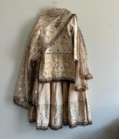 This 3 piece set is made from Raw Silk with handwork all over. The set comes in a shirt, sharara, and dupatta. Can be customized.  We also do custom orders, reach out to us to learn more. Sets With Resham Embroidery For Wedding And Eid, Resham Embroidered Sets For Wedding And Eid, Eid Wedding Sets With Resham Embroidery, Unstitched Wedding Saree Sets, Wedding Sets In Chinon With Zari Work, Wedding Sets With Dabka Work For Eid, Wedding Sets With Dupatta In Chinon, Bollywood Wedding Sets With Dabka Work, Designer Raw Silk Sets With Dabka Work