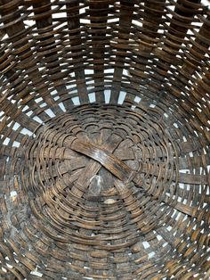 the inside of a basket made out of wood