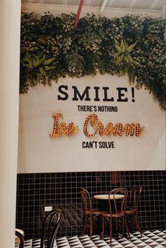 a restaurant sign that says smile there's nothing ice cream can't solve