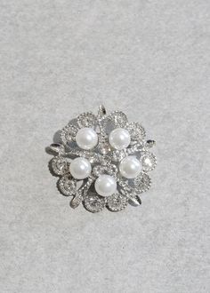 Easy to match elegant brooch for different clothes Strong and durable, nickel-free, lead-free, cadmium-free, hypoallergenic Silver Brooch Lapel Pin For Wedding, Silver Wedding Lapel Pin, Silver Rhinestone Pins For Formal Occasions, White Rhinestone Brooches For Formal Occasions, Rhinestone Pins For Wedding, Formal Silver Pins With Rhinestones, Elegant Rhinestone Pins For Wedding, Formal White Brooches With Rhinestones, Formal White Rhinestone Brooches