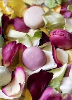 there are many different types of candies on the table with flowers all over them