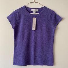 Brand New With Tags. 100% Cashmere Short Sleeve Tee, Size S Color: Iris Heather (Purple/Blue) Fitted Basic Purple Top, Basic Lavender Crew Neck Top, Lavender Crew Neck Basic Top, Fitted Lavender Short Sleeve Top, Purple Fitted Short Sleeve Top, Fitted Purple T-shirt With Crew Neck, Lavender Relaxed Fit Crew Neck Top, Fitted Purple Crew Neck T-shirt, Fitted Purple Crew Neck Sweater