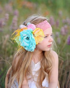 Glam up your photoshoot or just your trip to the store with this floral, feather headband designed with a stretchy elastic lace band for a stay-put fit. ♥ Spot clean ♥ Due to each headpiece being handmade, not all headbands will look exactly like the photo shown. This makes each headpiece more unique.   ♥ Please Note: Our headpieces may contain small parts, always supervise little ones when they are wearing our products. Summer Flower Headpiece With Matching Headband, Whimsical Summer Headband With Handmade Flowers, Handmade Flower Hair Accessories For Summer, Summer Flower Headband Hair Accessories, Floral Headband For Summer, Summer Handmade Flower Hair Accessories, Summer Flower Decoration Headband, Bohemian Headband With Handmade Flowers, Summer Adjustable Handmade Flowers Headband