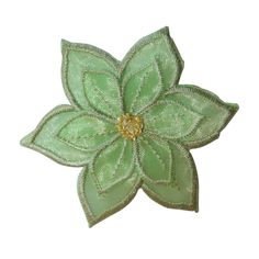 a green flower with leaves on it