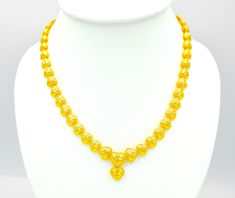 Yellow Jewelry For Anniversary And Festivals, Yellow 22k Gold Round Necklace, Yellow 22k Gold Necklaces For Anniversary, Yellow Round Necklace For Celebration, Yellow Necklace For Festival Gifts, Yellow Necklace For Festivals And Gifts, Yellow 22k Gold Necklaces With Round Beads, 22k Gold Round Beads Yellow Necklace, Yellow 22k Gold Necklace With Round Beads