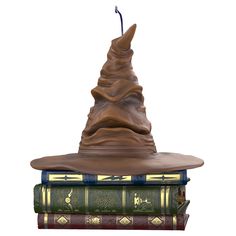 a harry potter hat sitting on top of two books