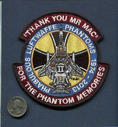 an embroidered patch with the words thank you mr mac, and a photo of a fighter jet