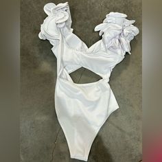 I Bought This For My Florida Bachelorette Trip And Never Got Around To Wearing It! Beach Season Party Bodysuit With Ruffles, Flirty Fitted Bodysuit For Beach, Summer Party Bodysuit With Ruffles, White One Piece For Beach Party, White Bodysuit For Beach Season Parties, Spring Party One Piece With Ruffles, White Party One Piece For Beach Season, Chic Ruffled One-piece For Party, White One Pieces For Beach Party