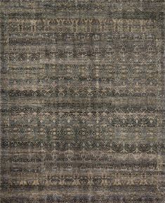 an area rug with many different colors and patterns on the carpet, including grays