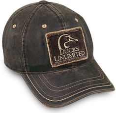 Introducing our Ducks Unlimited weathered cotton cap for men, featuring a structured, low crown design that combines both style and comfort. The cap boasts a pre-curved visor for added convenience. On the front, you'll find a frayed patch with a brushed stitch for a vintage touch, while the back showcases brushed embroidery to elevate its overall appeal. The visor is accentuated with a heavy decorative stitch, adding a touch of sophistication. With its convenient hook and loop tape closure, this Brown Curved Visor Hat For Outdoor, Brown Hat With Curved Visor For Outdoor, Brown Canvas Baseball Cap, Brown Cotton Baseball Cap For Sports, Brown Cotton Hat With Curved Visor, Mens Visor, Ducks Unlimited, Hunting Hat, Outdoor Cap