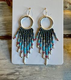 image Bohemian Beaded Dangle Earrings With Fringe, Beaded Fringe Dangle Tassel Earrings For Festival, Bohemian Beaded Fringe Dangle Earrings, Fringe Dangle Chandelier Earrings For Festival, Bohemian Chandelier Earrings With Fringe And Round Beads, Bohemian Fringe Dangle Chandelier Earrings, Bohemian Chandelier Earrings With Fringe, Bohemian Chandelier Earrings With Tassels, Bohemian Long Drop Fringe Earrings