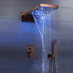 an open shower head with water running from it