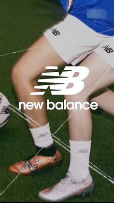 the new balance logo is displayed on a soccer player's legs