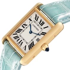 Cartier Tank Louis Yellow Gold Teal Leather Strap Mens Watch W1529756. Quartz movement. 18k yellow gold case 25.0 x 33.0 mm. Circular grained crown set with a blue sapphire cabochon. . Scratch-resistant mineral crystal. Silvered opaline dial with black radial Roman numeral hour markers and inner minute track. Sword shaped blue hands. Date calendar at 3 o'clock aperture. Secret Cartier signature at VII. Teal leather strap with 18K yellow gold tang buckle. Vintage Cartier Yellow Gold Watch, Vintage Yellow Gold Cartier Watch, Vintage Gold Cartier Watch Accessories, Vintage Cartier Gold Watch Accessories, Cartier Gold Watches For Formal Occasions, Luxury Gold Cartier Watch, Cartier Gold Watch With Rectangular Dial, Gold Cartier Watch With Rectangular Dial, Formal Rectangular Yellow Gold Watch Bands