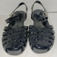 New Comes From Smoke Free Home All Items Are Kept In A/C Never Used Kept In Storage Retro Jellies In Shiney Black Shade Pvc Rubber Material Buckle Closure Will Be Mailed Without Box Various Us Sizes Available Sz 6 Toe To Heel 9" L Sz 7 Toe To Heel 9.25" L Sz 8 Toe To Heel 9.75" L Sz 9 Toe To Heel 10" L Sz 10 Toe To Heel 10.5" L Sz 11 Toe To Heel 10.75" L Black Closed Toe Jelly Sandals For Spring, Black Ankle Strap Jelly Sandals For Party, Black Closed Toe Jelly Sandals In Synthetic, Black Flat Jelly Sandals With Buckle Closure, Black Jelly Sandals With Buckle Closure, Black Closed Toe Jelly Sandals, Casual Black Closed Toe Jelly Sandals, Adjustable Black Flat Jelly Sandals, Trendy Black Ankle Strap Jelly Sandals