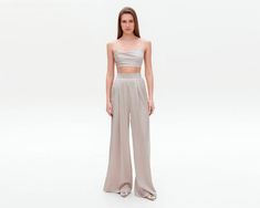 Beige Satin Pants, Wide Leg Pants, Silk Pants, Satin Trousers, Women Pants, Womens palazzo Suit, Satin palazzo pants, Beige Satin Set ⭐Size: Please write your chest, waist, hips, height, and we will make a pants to your individual measurements! After you place your order, we may ask you for additional measurements. We do this to ensure that the pants fits you perfectly👌😊 ⭐Our fabric: We have used a premium quality satin: it's light and soft, pleasant to wear and easy to wash.  ⭐Shipping: ✈️We have two shipping options that we can offer: Free Shipping and Express Shipping. ✅ Free shipping takes about two weeks. ✅ Express shipping takes only 8-10 days. An extra fee of $35 should be paid for this option. When placing your order, please, keep in mind that it will take us 3 to 6 business days Satin Palazzo Pants, Linen Suits Women, Silk Slip Skirt, Pants Satin, Lilac Bridesmaid Dresses, Silk Maxi Skirt, Satin Set, Palazzo Suit, Satin Trousers