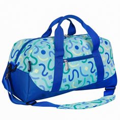 Make packing for sleepovers, sports practices, and weekends at grandma’s a breeze with Wildkin's Kids Overnighter Duffel Bag! The spacious interior means your child can pack the essentials and then some, while the exterior zippered compartment conveniently stores the most important items so that your child can access them in a flash. Each Overnighter Duffel Bag is made with a durable exterior fabric and a nylon-lined interior. The Overnighter Duffel Bag comes complete with two attached carrying Casual Blue Duffle Bag For School, Functional Blue Gym Bag For Overnight Trips, Blue Sporty Gym Bag For Sports, Functional Blue Duffle Bag For School, Casual Blue Duffle Bag For Outdoor Activities, Casual Blue Gym Bag For School, Functional Blue Travel Bag For Sports, Sporty Blue Duffle Bag For Overnight Trips, Sporty Blue Travel Bag For Sports