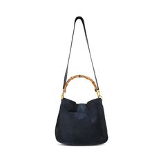 Gucci vintage bamboo handbag in navy blue suede and leather with a top push button closure in gold hardware. Features a single bamboo handle with a detachable shoulder strap, and grey canvas lining with an inner zip pocket. Brand = Gucci Condition = 8/10, Very good. Some wear in suede. c Dimensions = 11" x 9.75" x 3.5" Top Handle = 5" Strap Drop = 18" Material = Suede/Leather Hardware = Gold SKU = 20245-104 Gucci Formal Hobo Bag With Gold-tone Hardware, Bamboo Handbag, Blue Double Handle Bag With Gold-tone Hardware, Navy Handbag, Gucci Bag With Gold-tone Hardware And Top Handle, Gucci Tote Shoulder Bag With Gold-tone Hardware, Gucci Vintage, Gucci Black Bag With Gold-tone Hardware, Gucci Bamboo