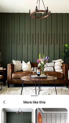 a living room with green walls and furniture