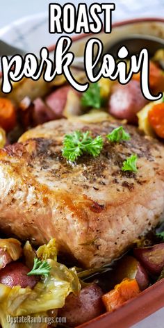 roast pork loin with potatoes and carrots in a pan