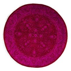 a round rug with an intricate design on it