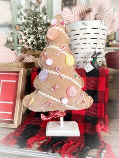 a decorated christmas tree sitting on top of a table