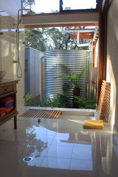 the bathroom is clean and ready to be used as a saunach or shower