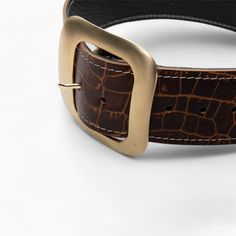 Upgrade your wardrobe with this exquisite brown leather belt, designed for the discerning individual who values both style and substance. Featuring a robust square matte gold buckle, this belt is more than just an accessory--it's a statement piece. Handcrafted from premium genuine leather with a distinctive crocodile embossed pattern, this belt blends durability with a refined aesthetic that's perfect for both casual and formal wear. Premium Quality & Materials: Crafted from top-grade genuine le Embossed Design, Brown Leather Belt, Suspender Belt, Matte Gold, Classic Elegance, Suspenders, Formal Wear, Everyday Look, Leather Belt