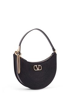 Mini Hobo VLogo Signature Valentino Garavani leather and rafia bag with metal and leather shoulder strap- Metal And Leather Handle- Closure With Zip- Internal Leather Pocket- Made In Italy- Leather- Lining : Leather Designer Shoulder Bag With Leather Handles For Evening, Luxury Hobo Evening Shoulder Bag, Luxury Evening Hobo Shoulder Bag, Evening Crossbody Hobo Bag With Metal Hardware, Evening Shoulder Bag With Adjustable Strap And Round Handle, Luxury Evening Shoulder Bag With Round Handle, Evening Shoulder Bag With Round Handle And Metal Hardware, Evening Hobo Crossbody Bag With Metal Hardware, Evening Shoulder Bag With Chain Strap And Round Handle