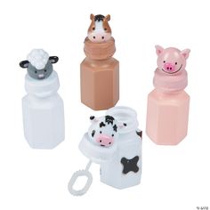 four different types of milk bottles with animals on them