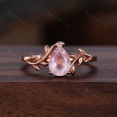 Here we have a Pear cut rose quartz ring vintage twig leaf design ring women unique nature inspired engagement ring rose gold wedding ring pink stone ring. This is the perfect gift for mom, wife, fiancee, girlfriend, valentine, daughter, family or friend. It is a special gift for mother's day, valentine's day, wedding, anniversary, birthday, Christmas, Easter, New Year's and any holiday. You can choose if you want 14Kt White Gold, 14Kt Yellow Gold or 14Kt Rose Gold. Emerald Ring: https://www.ets Rose Quartz Gold Ring, Rose Quartz Wedding Ring, Wedding Ring Pink, Pink Stone Engagement Rings, Rose Quartz Wedding, Rose Quartz Ring Engagement, Pink Stone Ring, Pink Wedding Rings, Pink Stone Rings