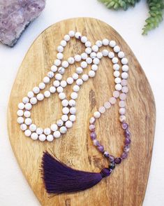 "- Gift For Her Jewelry Yoga Stack Boho Handmade Jewelry Rose Quartz Amethyst Howlite Mala Beads Mala Necklace Tassel Yoga Gift - FREE SHIPPING This listing is for ONE mala necklace. Each necklace is created by hand, and is available in a hand-knotted or non-knotted version. These necklaces can also be used as wrapped bracelets. This mala is available in both 6mm and 8mm beads, and is either knotted with a beautiful purple cord with matching nylon tassel, or on durable stretch cord for the non-k Hand-strung Purple Bohemian Beads, Bohemian Hand-strung Purple Beads, Purple Hand-strung Bohemian Beads, Purple Bohemian Hand-strung Beads, Handmade Lavender Necklace For Meditation, Lavender Handmade Necklace For Meditation, Spiritual Beaded Necklaces For Meditation With Faceted Beads, Lavender Round Beads Spiritual Necklace, Bohemian Amethyst Beaded Necklaces For Healing