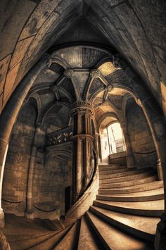 a spiral staircase in an old building