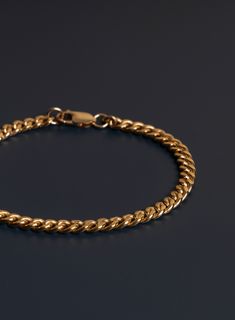 Sleek, minimalist 14k Gold Filled Cuban Chain Bracelet for Men. Select your size from drop down menu. Material: 14k Gold Filled Bracelet Width: 5mm Clasp: Lobster Claw Available in 7, 8, 9 inches. Classic Gold-plated Cuban Link Bracelet, Gold-plated Cuban Link Chain Bracelet, Gold-tone Cuban Link Bracelet For Gift, Everyday Yellow Gold Cuban Link Bracelet, Tarnish Resistant, Yellow Gold Cuban Link Bracelet, Tarnish Resistant, Cuban Chain Bracelet, Stainless Bracelet, Wrist Jewelry, Mens Gold Jewelry