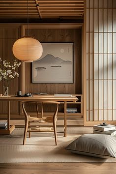 a room with wood paneled walls and a wooden table surrounded by pillows on the floor