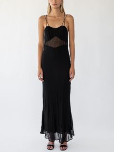 Stunning classic black maxi dress with sheer empire panel and double strap design. Cut on the bias and slightly sheer fabric. Measurements: 0 (XS): Bust 32.5"-33.5" Waist 24"-25" Hips 34"-35" 1 (S): Bust 34"-35" Waist 25"-26" Hips 35"-36" 2 (M): Bust 35"-36" Waist 26"-27" Hips 36"-37" 3 (L): Bust 36"-37" Waist 27"-28" Hips 37"-38" 100% Viscose, dry clean only Black Rose Dress, Vintage Clothes Women, Rose Dress, Black Maxi, Sheer Fabric, Strap Design, Sheer Fabrics, Apparel Design, Black Rose