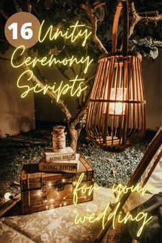 a table topped with books and a lamp next to a wooden basket filled with candles