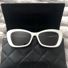 Brand New White Chanel Sunglasses Never Worn With Pearls On The Side And Case. Chic Optic White Sunglasses With Gradient Lenses, Luxury Optic White Sunglasses For Summer, Luxury White Sunglasses With Uv Protection, Elegant White Sunglasses With Uv Protection, Elegant Optic White Polarized Sunglasses, Chic White Polarized Sunglasses, Chic White Sunglasses With Polarized Lenses, Elegant Optic White Sunglasses With Tinted Lenses, Elegant Optic White Sunglasses With Mirrored Lenses