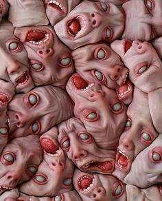 an image of many heads and mouths with eyes