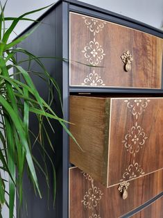 a wooden dresser with intricate designs on it