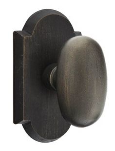 an old style door handle with a round knob on the front and side of it