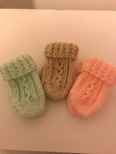 Newborn baby mittens,   knitted in king cole soft baby wool, perfect to keep your new born warm.  Handmade gift ideal for baby shower, new born baby gift. Choice of various colours, if you would like a certain colour please message me. Please take a look at our other items Feel free to get in touch with any queries you may have.                                                                                Take care. Winter Knitted Booties As A Gift, Hand Knitted Booties As Winter Gift, Hand Knitted Winter Booties As Gift, Winter Mittens, Baby Mittens, King Cole, Soft Baby, Baby Winter, Baby Soft