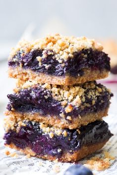 three blueberry bars stacked on top of each other