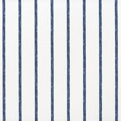 a ruler is next to a white and blue striped wallpaper that has stripes on it