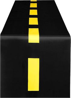 a black table with yellow stripes on it