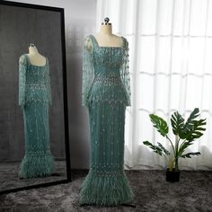 2024 Muslim Turquoise Long Sleeves Mermaid Evening Gown: Beaded and Feathered Elegance for Women's Party Glamour Feather Gown, Beaded Feather, Elegant Evening Dress, Mermaid Evening Gown, Dresses Quinceanera, Long Sleeve Evening Dresses, Evening Dress Fashion, Beaded Wedding, Luxury Wedding Dress