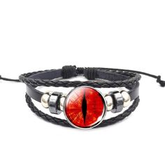 Add some interest to your collection with this dragon eye bracelet set. It symbolizes supernatural power, wisdom, strength, and hidden knowledge. Product Information Set comes with 4 individual bracelets Material: Leather/PU Leather Adjustable: sliding knots Length: adjustable 7 inches to 8.5 inches Glass charm Clasp Type: lace-up Handmade Adjustable Gothic Wristband For Gift, Gothic Style Metal Leather Bracelet As Gift, Gothic Leather Bracelet As Gift, Gothic Wristband Bracelet Gift, Gothic Leather Bracelet Gift, Adjustable Gothic Leather Bracelet Gift, Gothic Leather Bracelet, Dragon Eye Pendant, Dragon Eye Wire Wrap